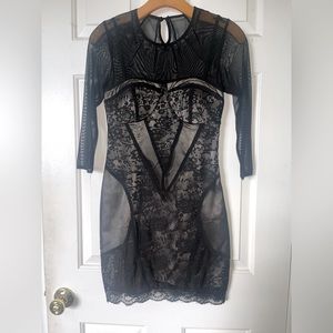 Vintage 3 quarter sleeve lace-body mini dress.